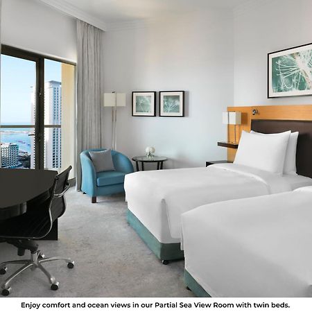Moevenpick Hotel Jumeirah Beach Dubai Esterno foto Partial Sea View Room
